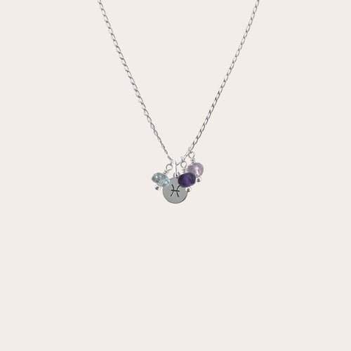 Collar signo con piedras