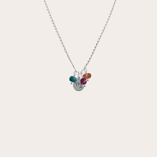 Collar signo con piedras