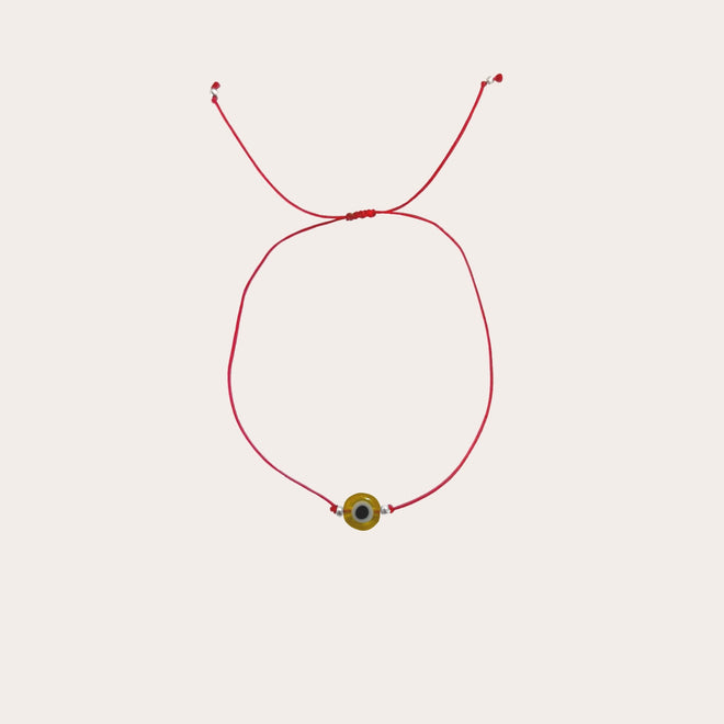 Pulsera ojo colores hilo rojo