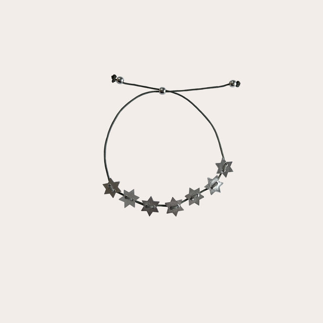 Pulsera Estrellas hilo gris