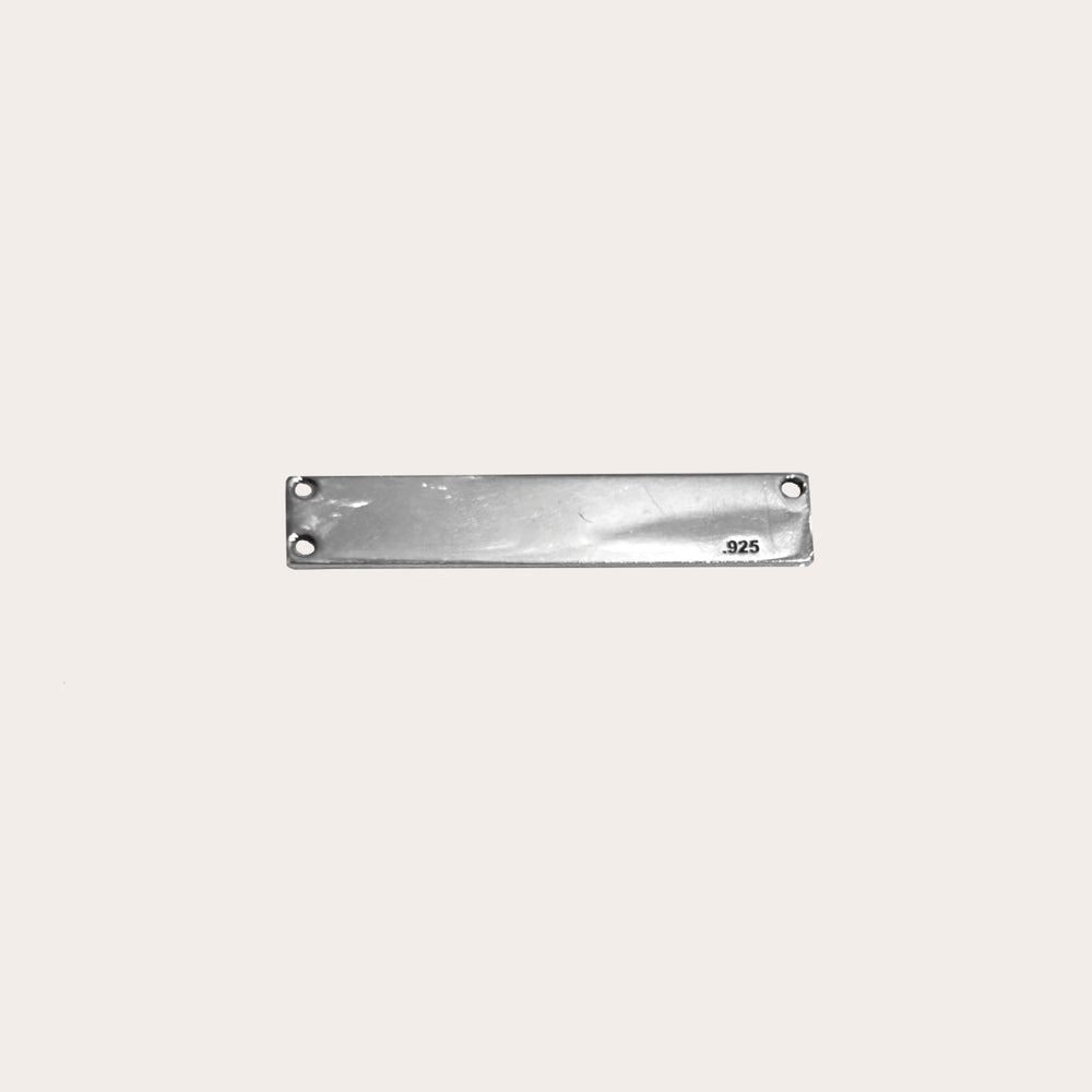 Placa rectangular con 3 perforaciones