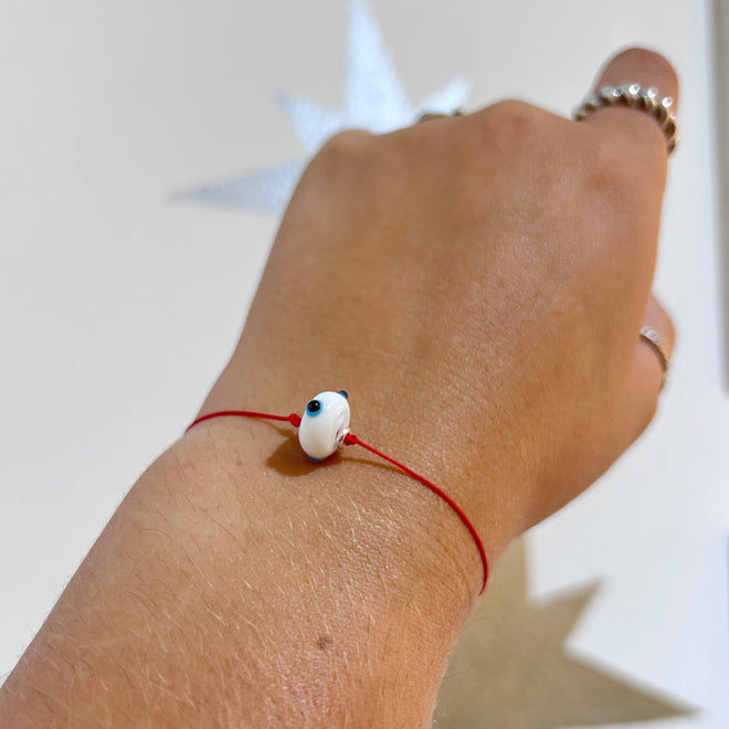Pulsera ojo hilo rojo