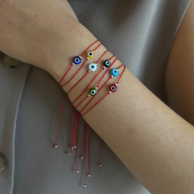 Pulsera ojo colores hilo rojo